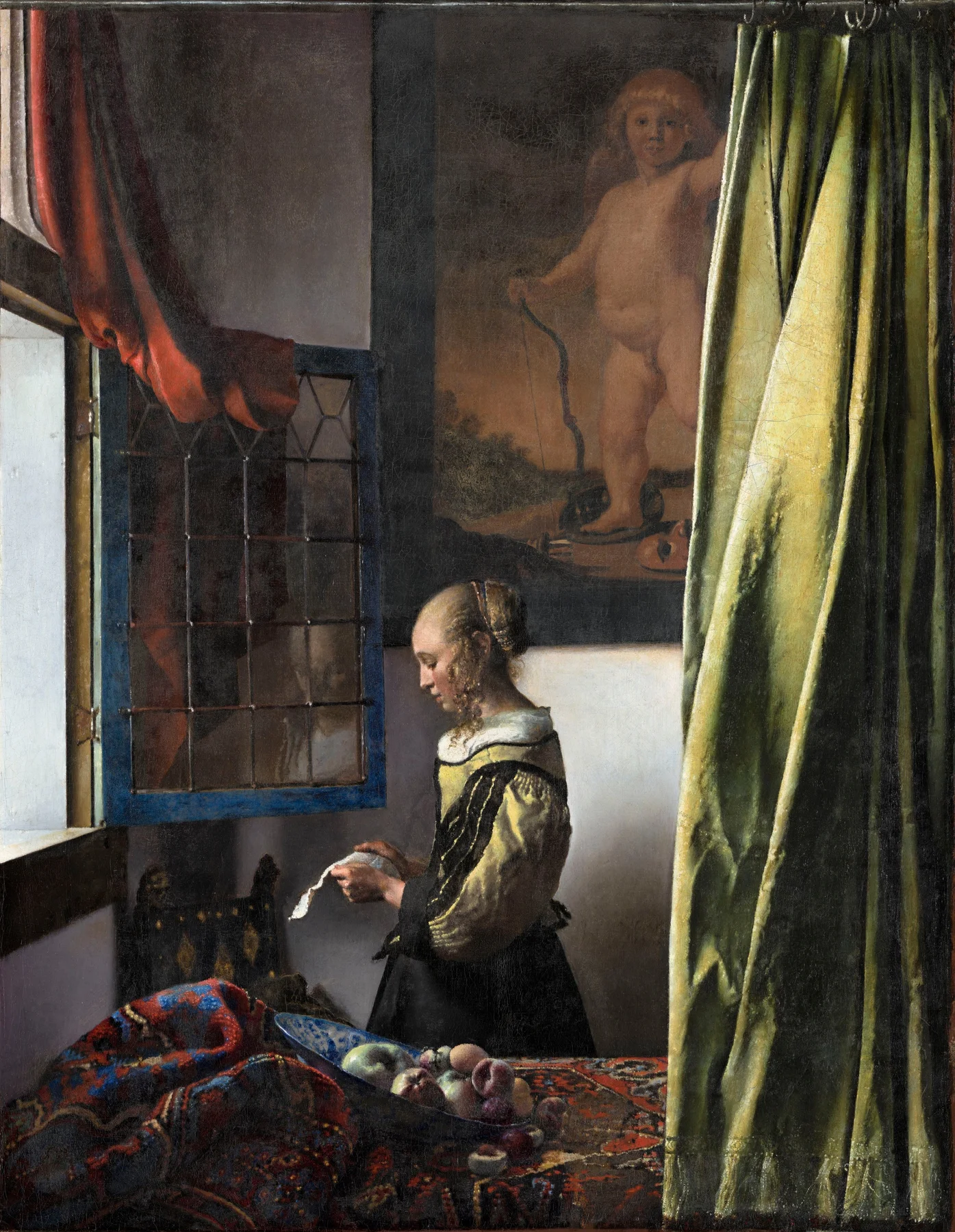 Muchacha leyendo una carta junto a la ventana — Johannes Vermeer