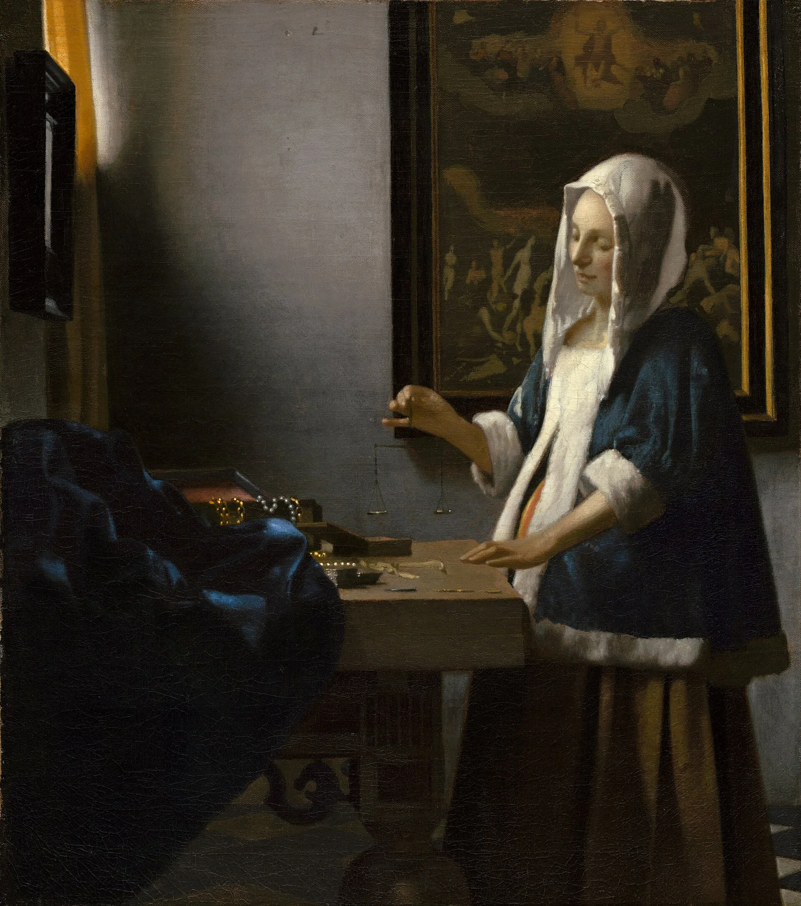 Woman Holding a Balance — Johannes Vermeer